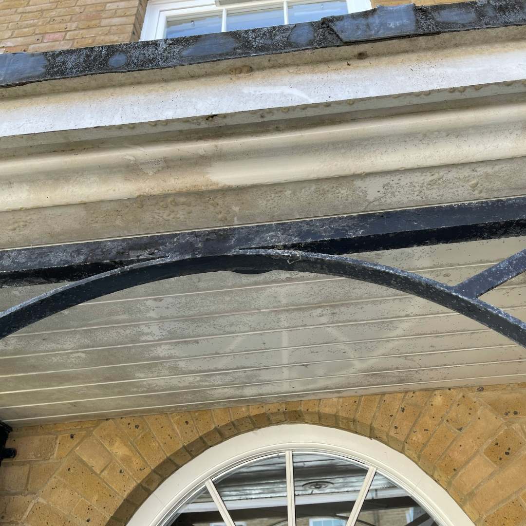 Professional gutter cleaning and debris removal in Dorchester